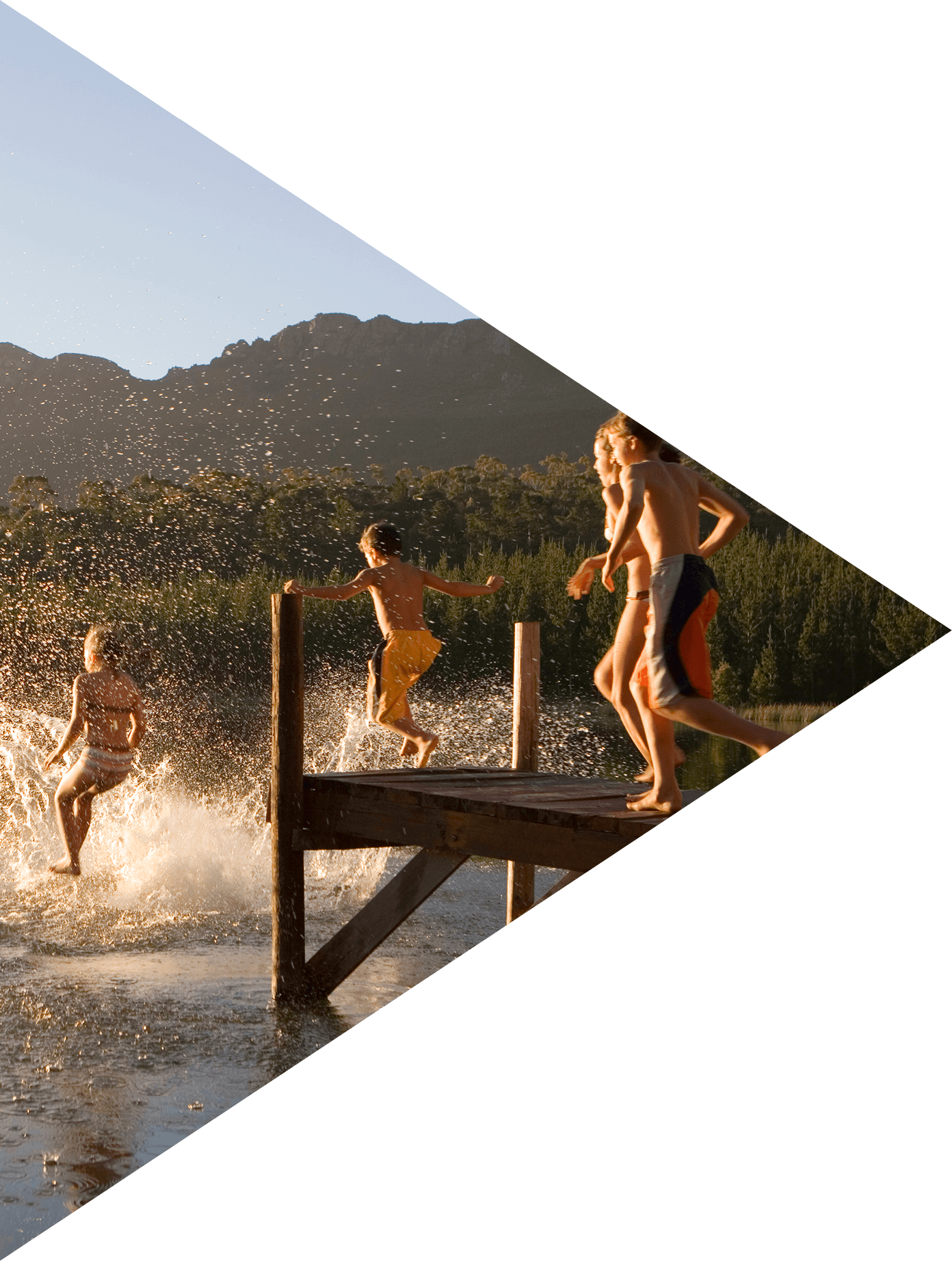 Image showing a group of children jumping in lake