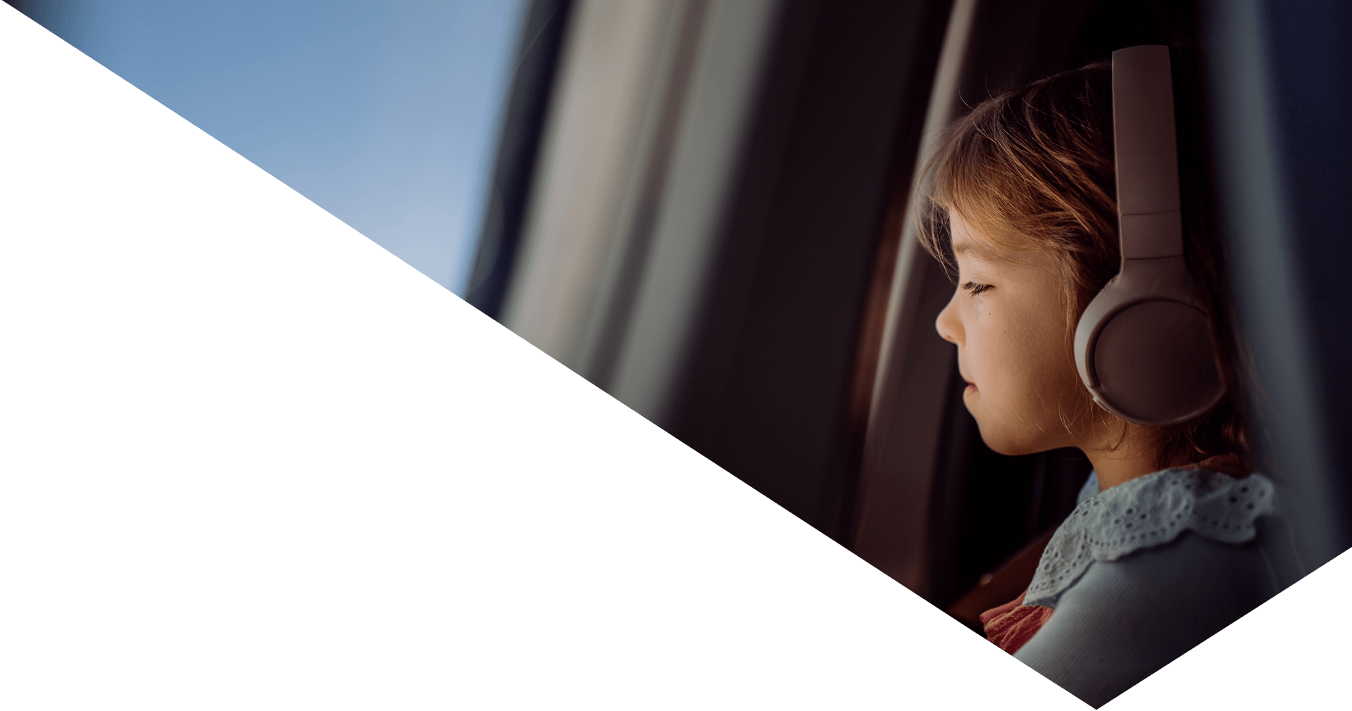 constant-attention-while-overseas-header-girl-looking-out-of-airplane-window