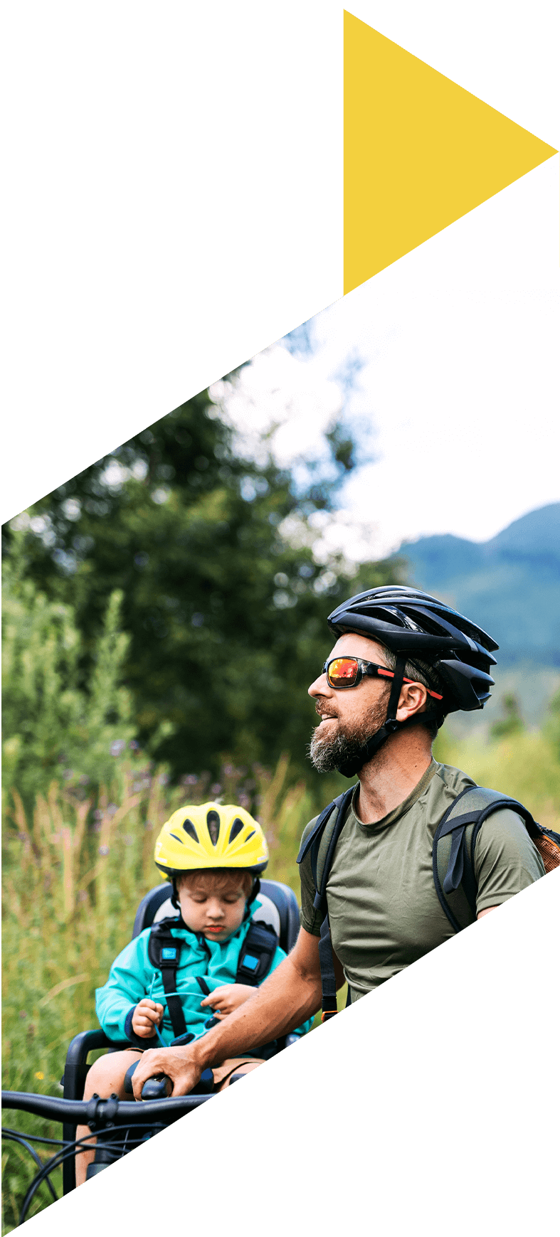 Image showing a father and son on a bike